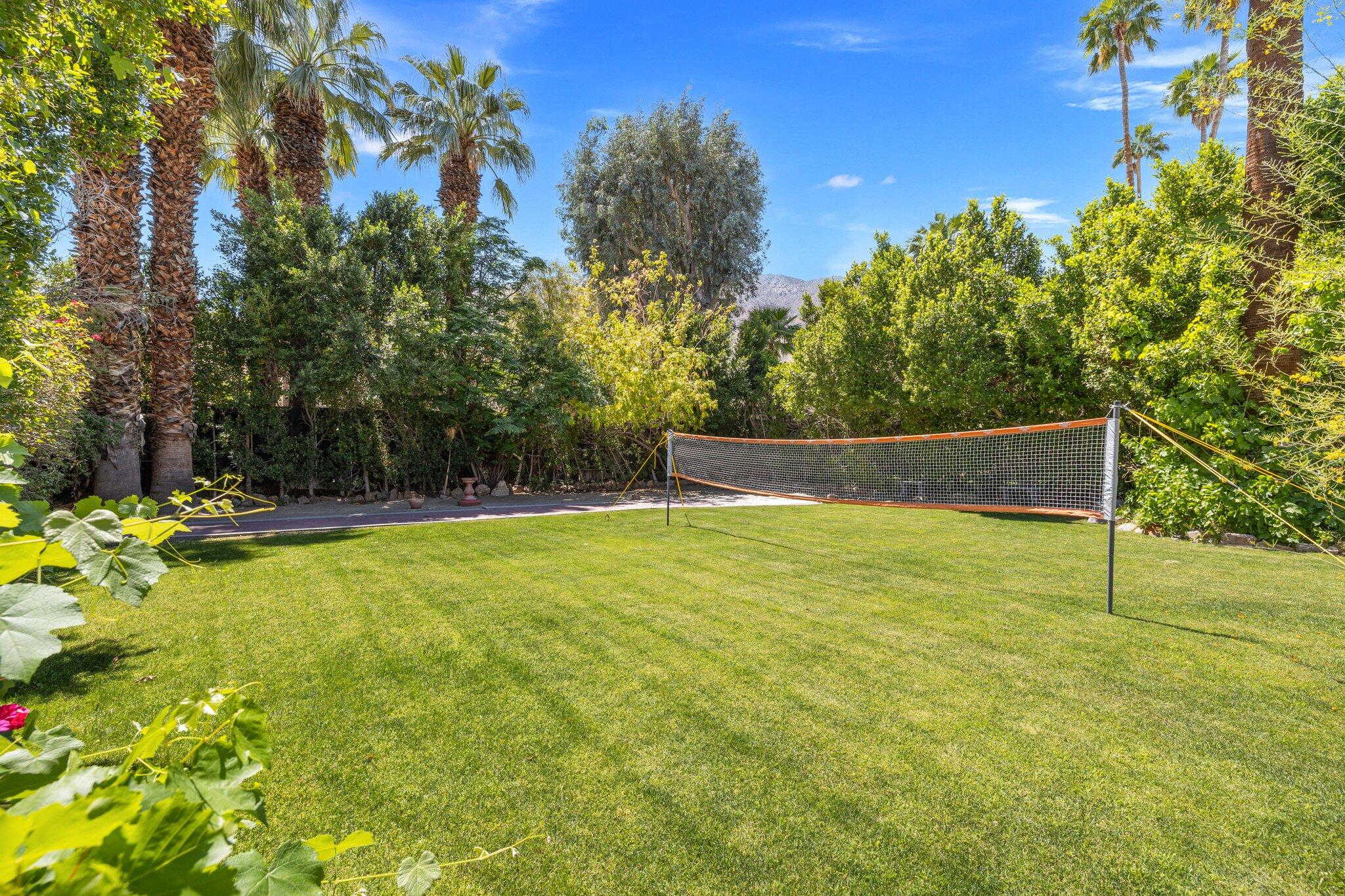 435 West Vereda Sur Palm Springs, CA 92262 - Photo 49 of 80 a view of a swimming pool with an outdoor seating and a yard