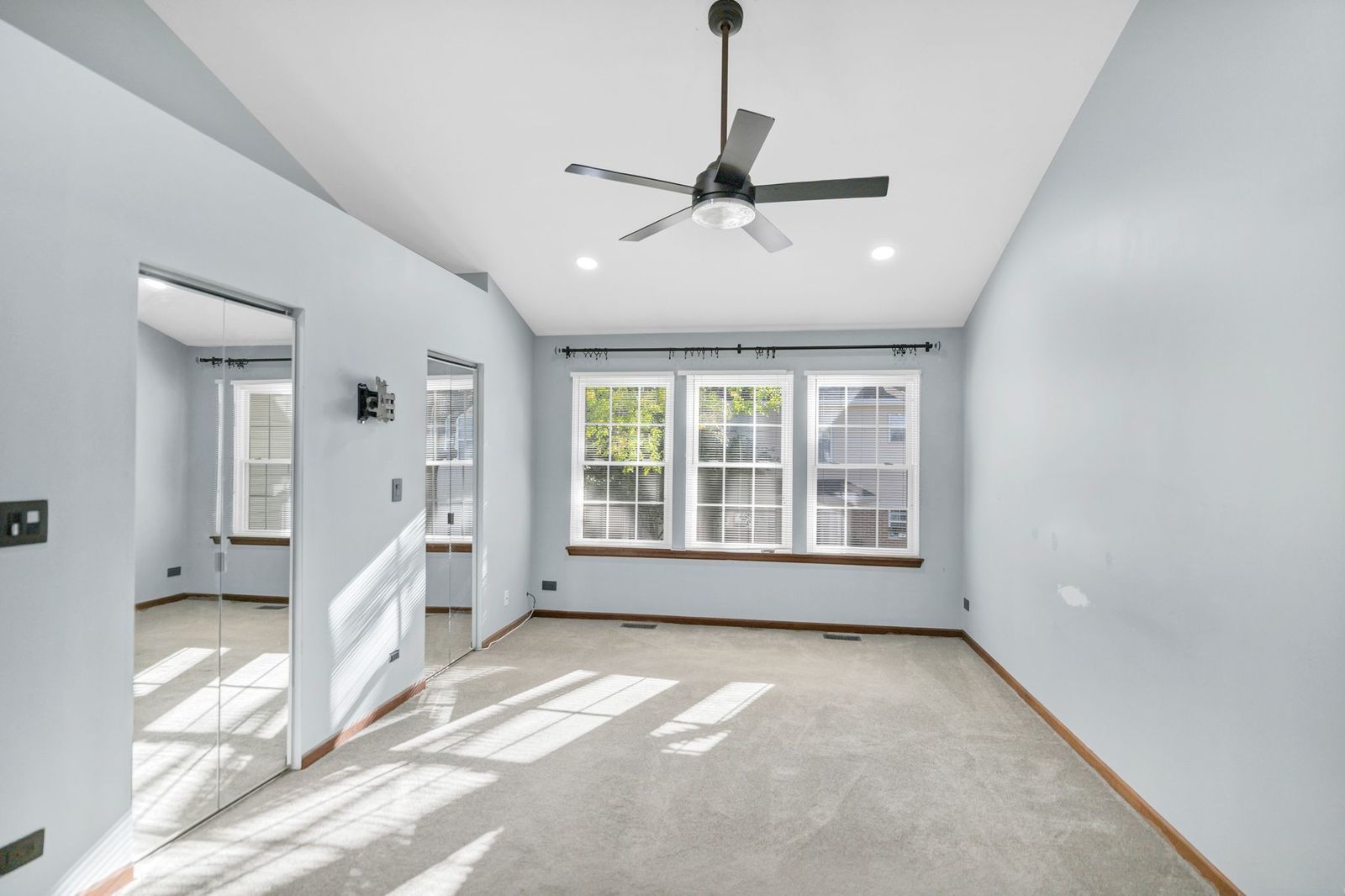 2116 Glasgow Court, Unit 2116 Hanover Park, IL 60133 - Photo 18 of 29 a view of an empty room with a window