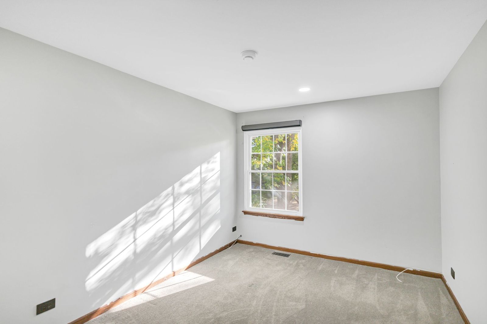 2116 Glasgow Court, Unit 2116 Hanover Park, IL 60133 - Photo 23 of 29 an empty room with windows