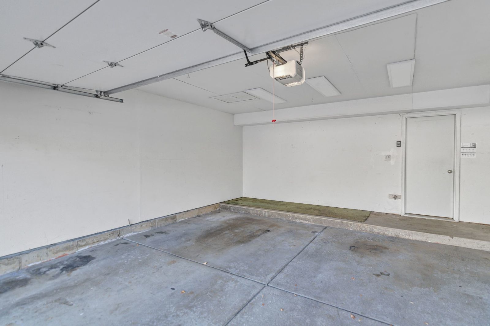 2116 Glasgow Court, Unit 2116 Hanover Park, IL 60133 - Photo 29 of 29 a view of a room with racks on the wall