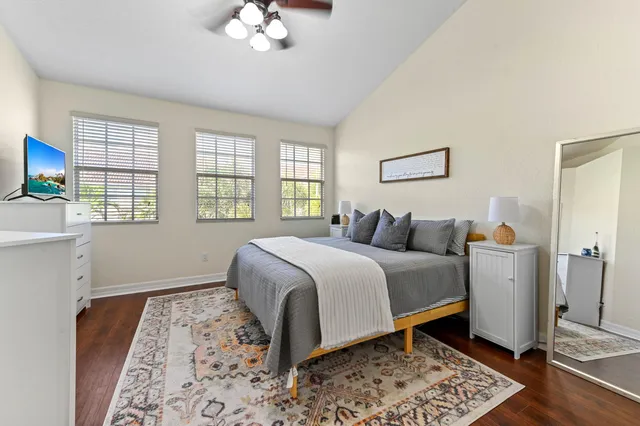 a bed room with a bed and a window