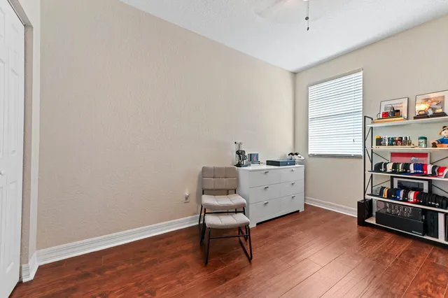 a room with furniture and a wooden floor