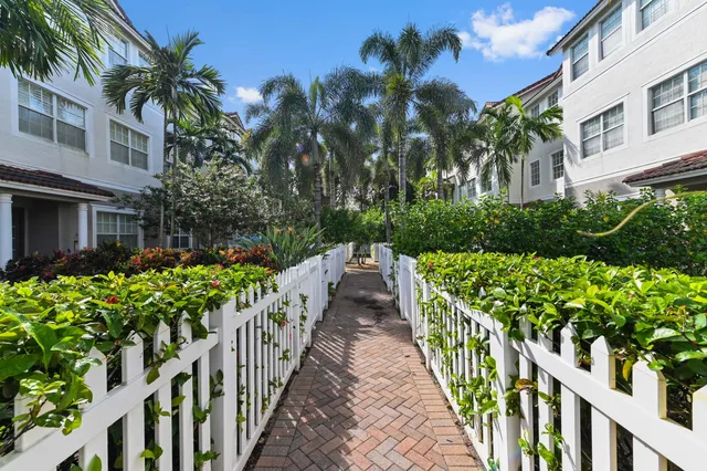 a view of a house with a street