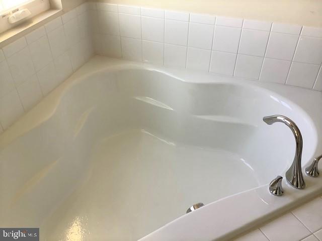 8708 Sagebrush Lane Laurel, MD 20724 - Photo 28 of 29 a close up of a bathtub