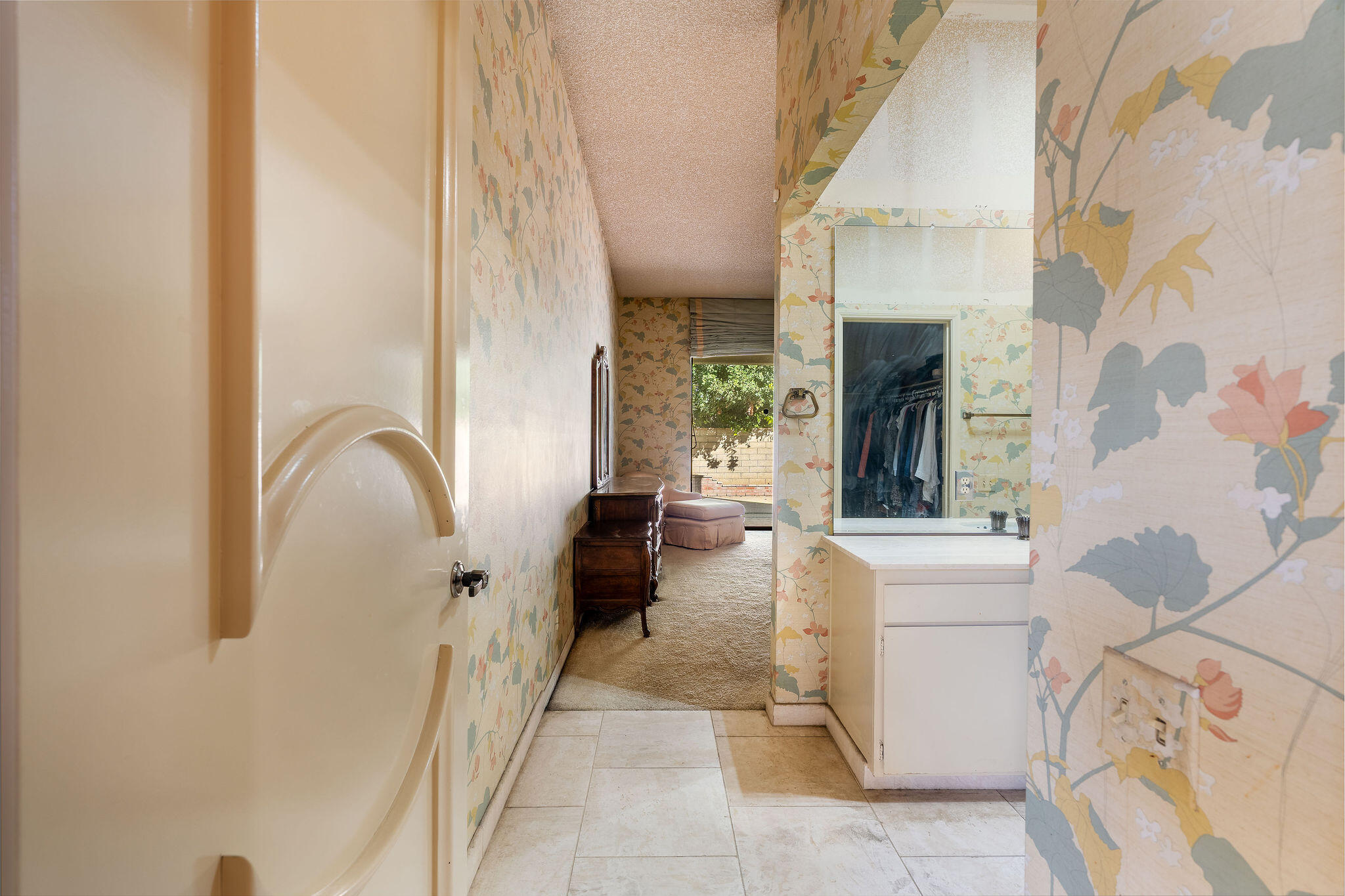 62 Sierra Madre Way Rancho Mirage, CA 92270 - Photo 17 of 46 a living room with furniture and a fireplace