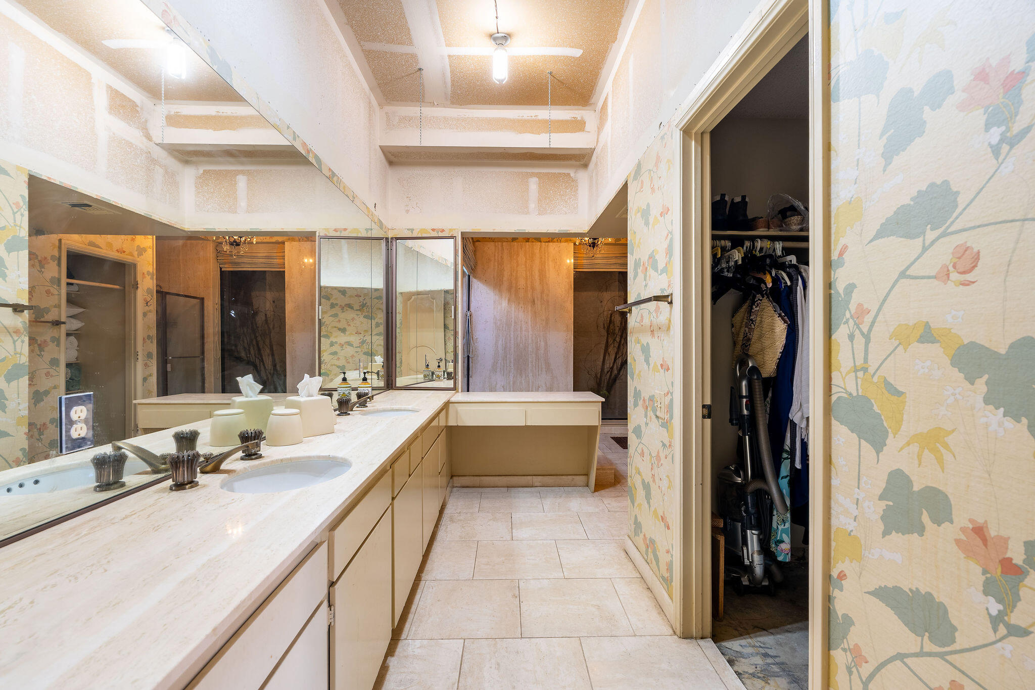 62 Sierra Madre Way Rancho Mirage, CA 92270 - Photo 18 of 46 a large white bathroom with a large tub sink and glass door