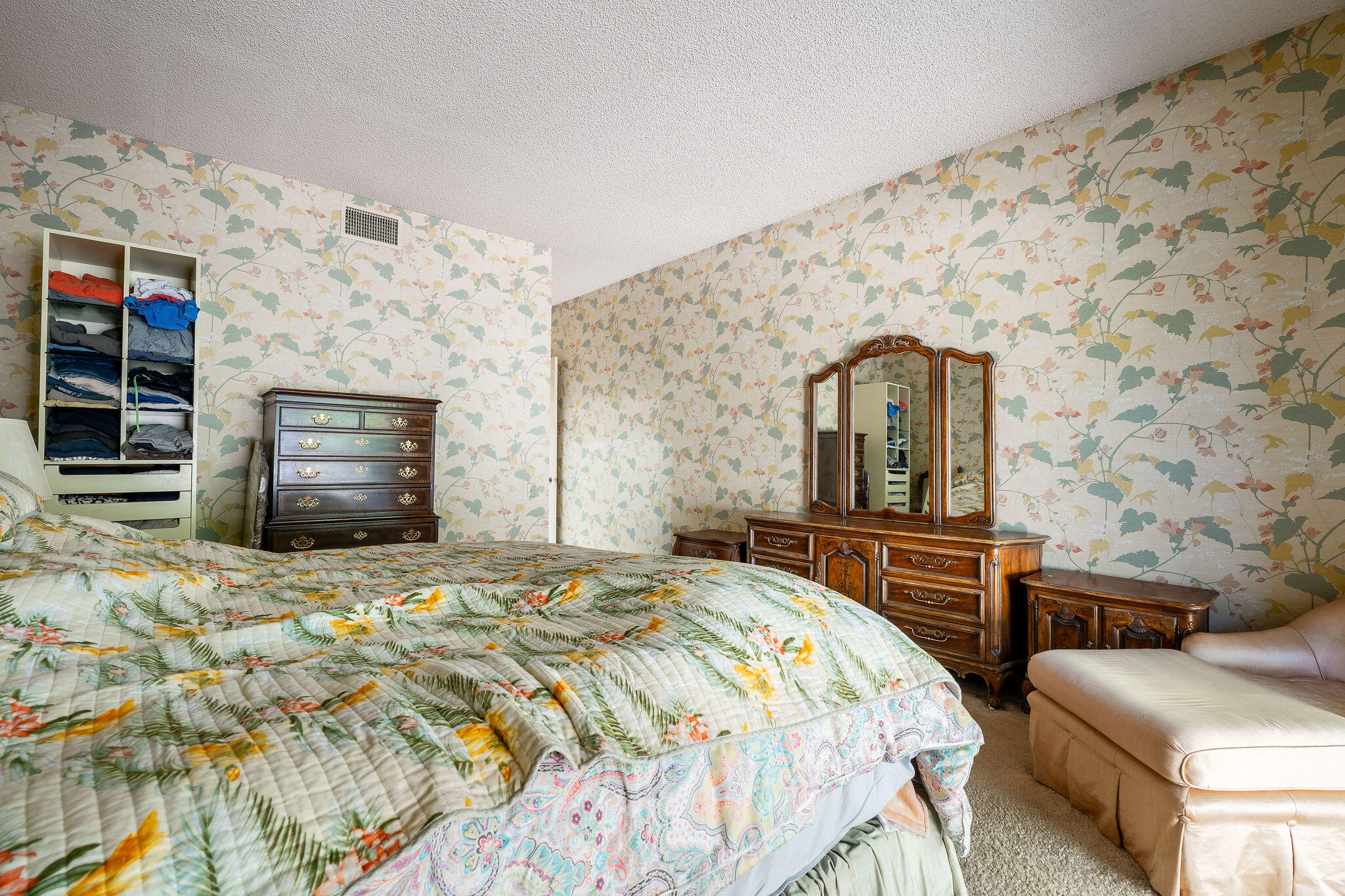 62 Sierra Madre Way Rancho Mirage, CA 92270 - Photo 23 of 46 a bedroom with a bed and a dresser