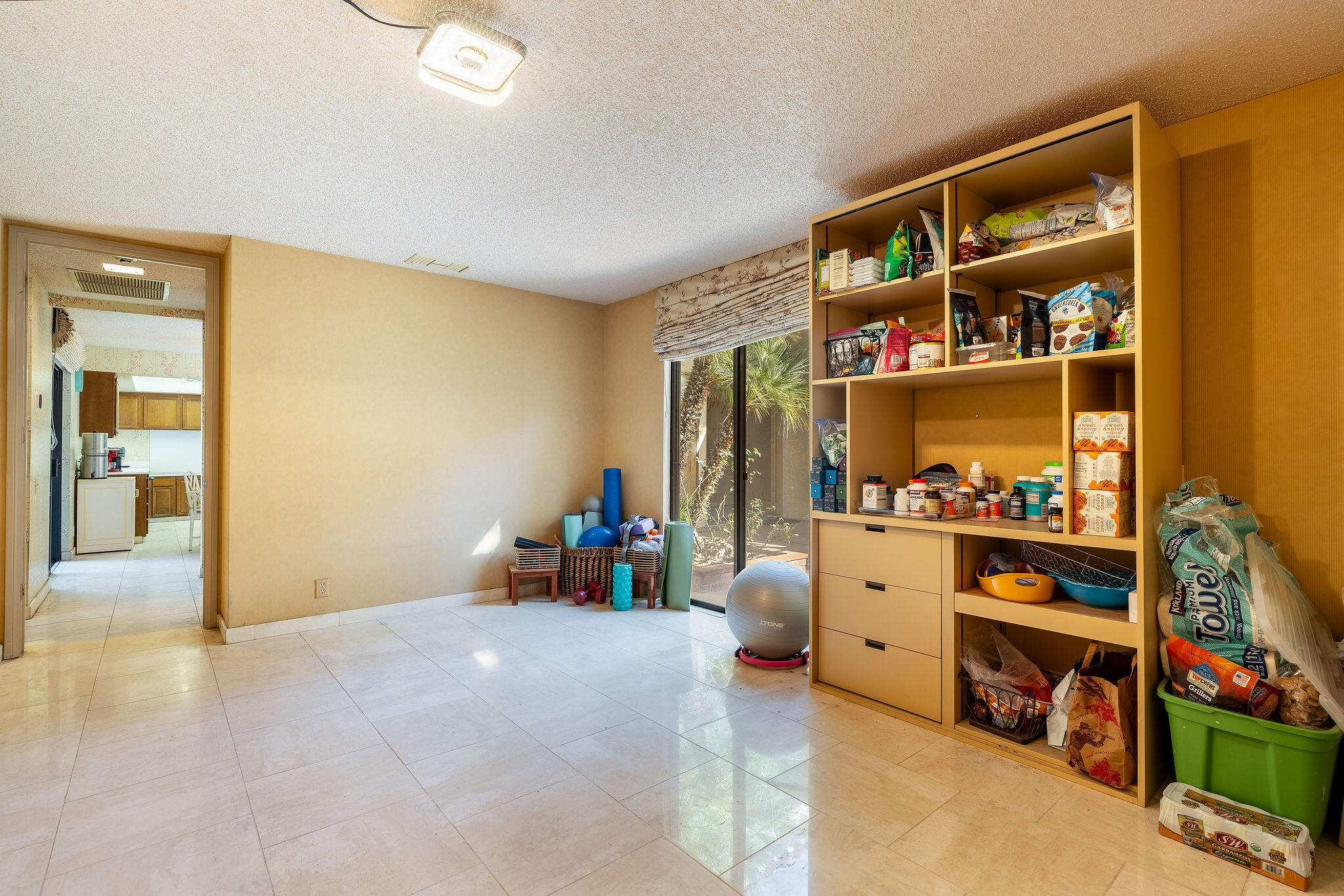62 Sierra Madre Way Rancho Mirage, CA 92270 - Photo 25 of 46 a view of an empty room with workspace and a window