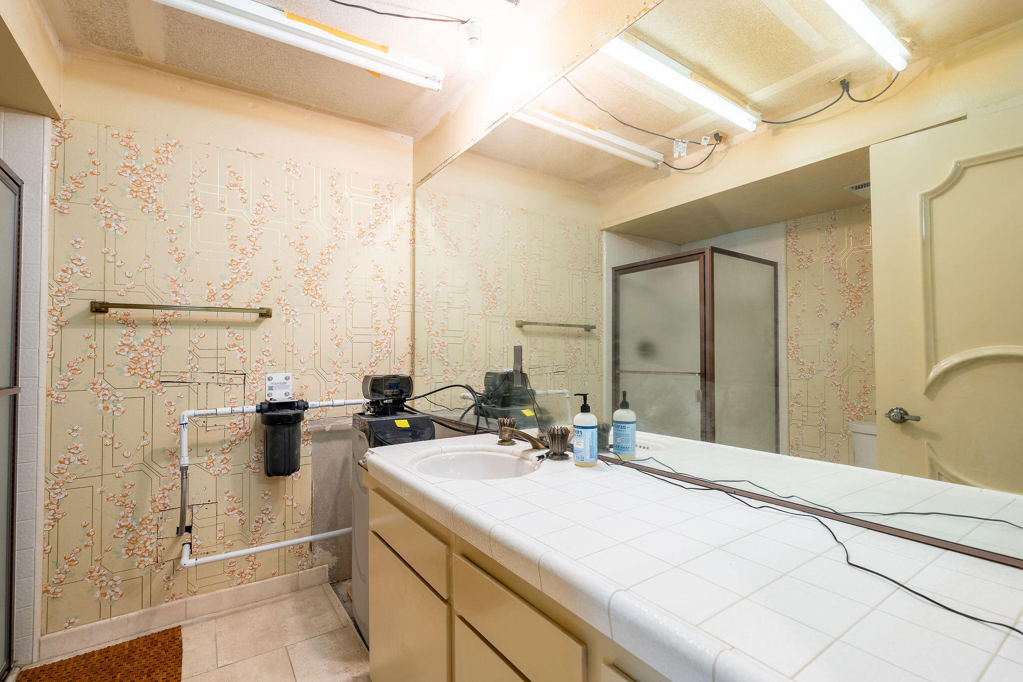 62 Sierra Madre Way Rancho Mirage, CA 92270 - Photo 26 of 46 a bathroom with a double vanity sink mirror and shower