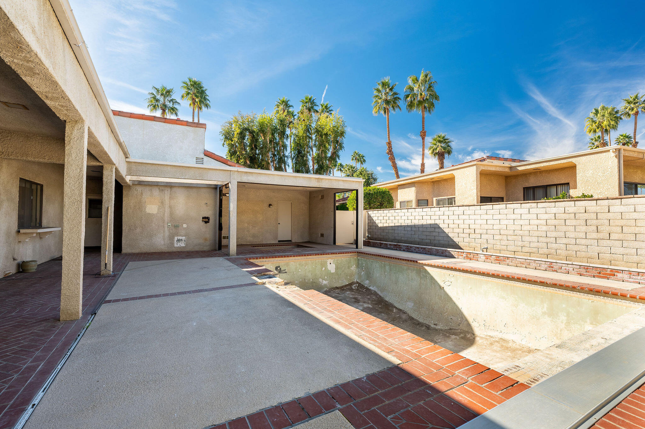 62 Sierra Madre Way Rancho Mirage, CA 92270 - Photo 37 of 46 a view of a house with pool and sitting area
