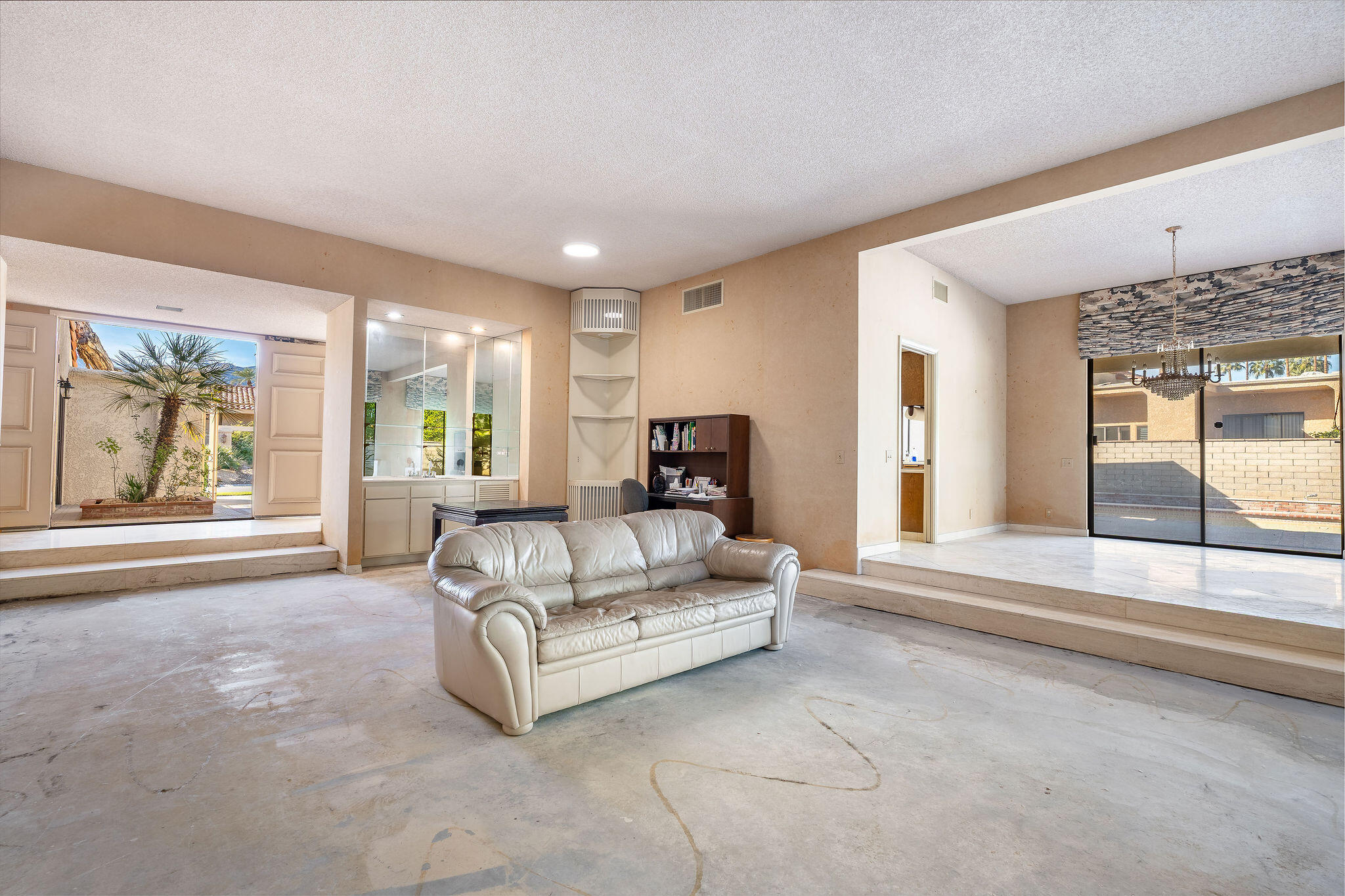 62 Sierra Madre Way Rancho Mirage, CA 92270 - Photo 7 of 46 a living room with furniture and a large window