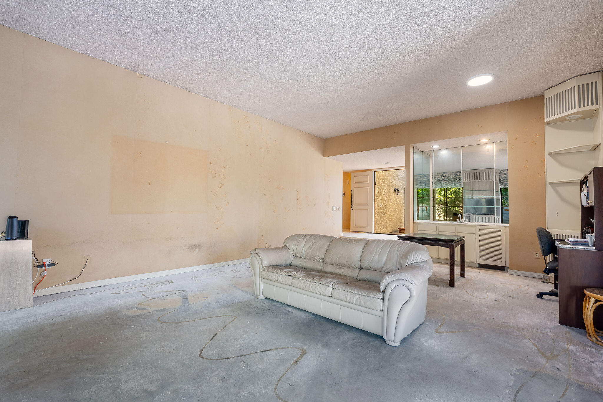 62 Sierra Madre Way Rancho Mirage, CA 92270 - Photo 8 of 46 a living room with furniture and a large window