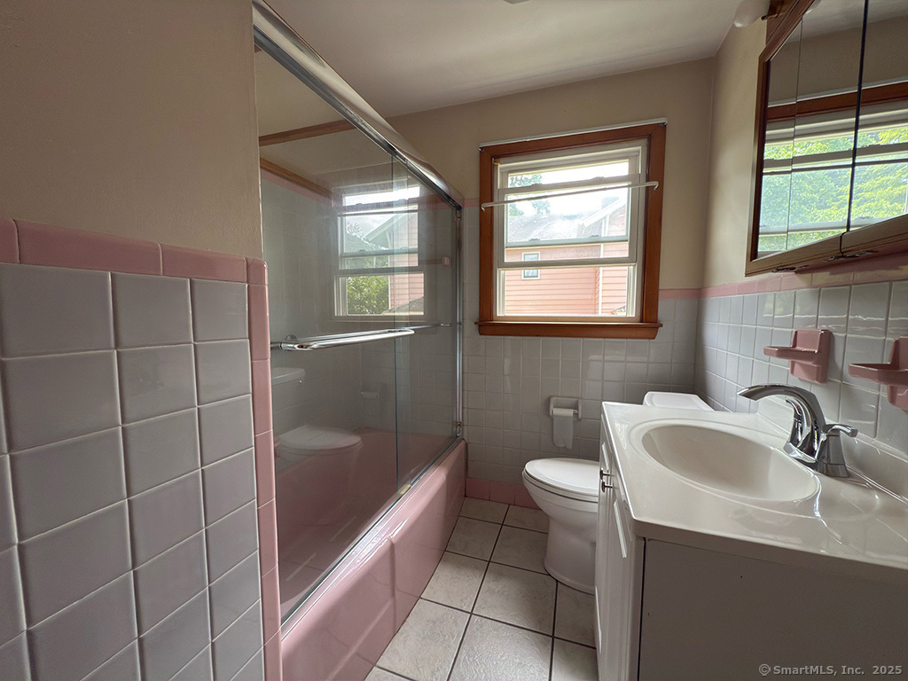 65 1st Avenue, Unit 2 New Haven, CT 06513 - Photo 8 of 13 a bathroom with a sink toilet and shower