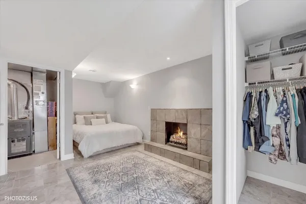 a bed room with a bed and a television