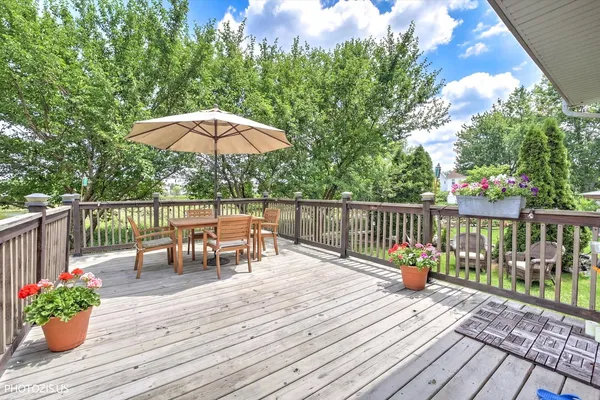 a view of a balcony with furniture
