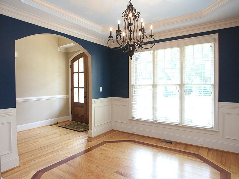 2317 Finley Ridge Lane Raleigh, NC 27615 - Photo 12 of 23 Tray Ceiling w/ Custom painting Technique, Wainscoting and Windows Overlooking Front Porch Dining Room