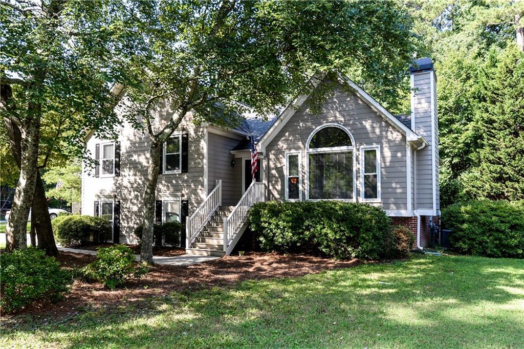 This charming home is on a level, corner lot