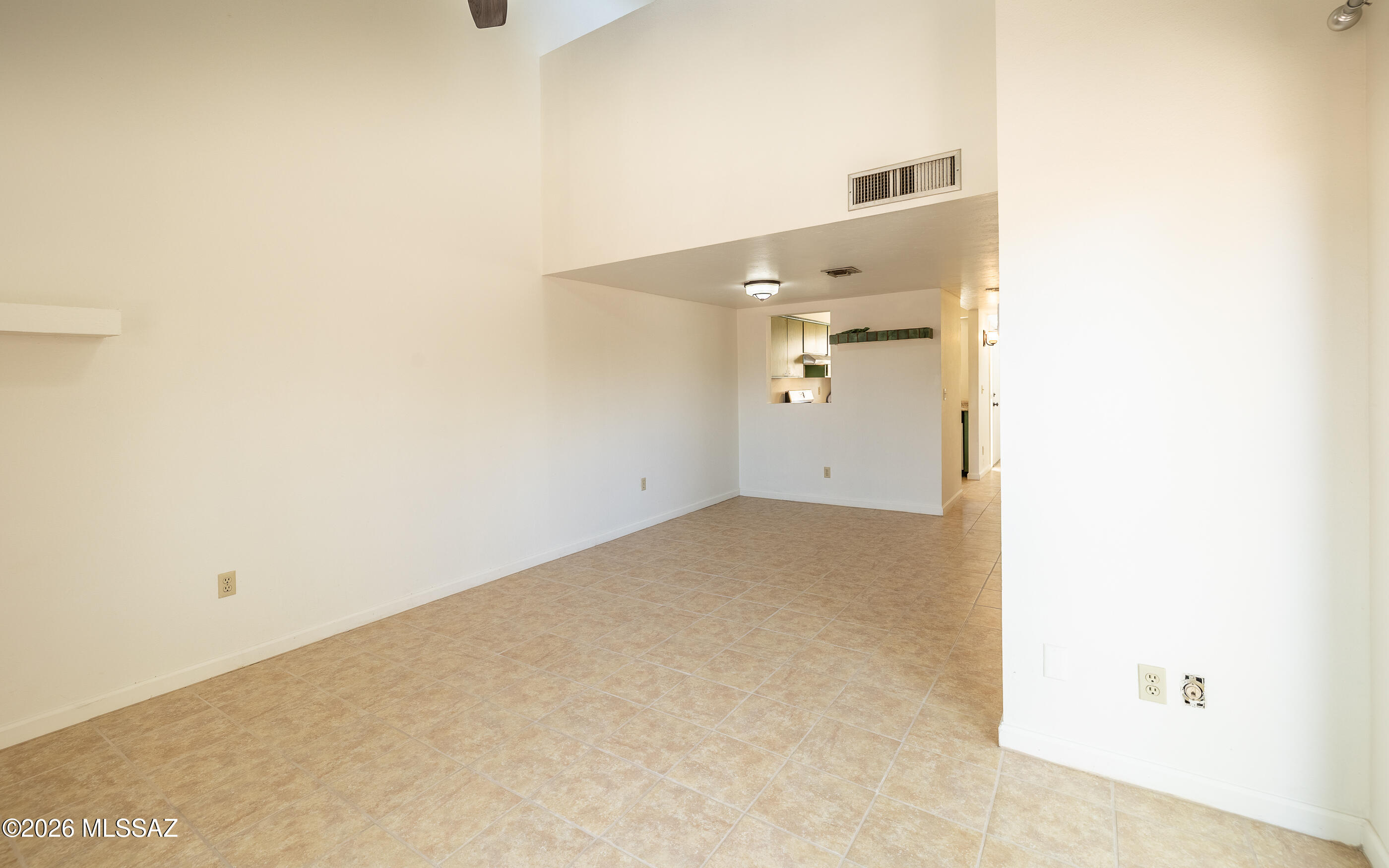 3750 North Country Club Road, Unit 46 Tucson, AZ 85716 - Photo 11 of 34 an empty room with windows