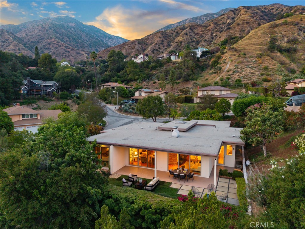 598 Camillo Road Sierra Madre, CA 91024 - Photo 54 of 75 an aerial view of a house with swimming pool and mountains
