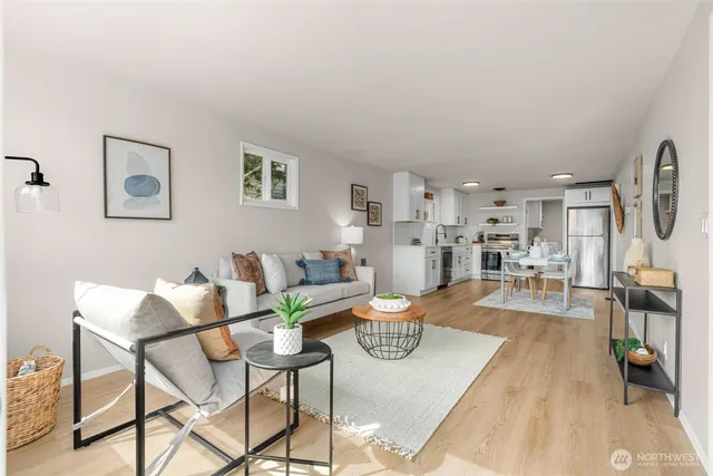 a living room with furniture and a table