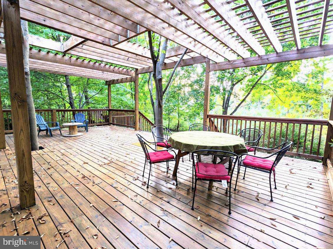 24 Blue Ridge Road Titusville, NJ 08560 - Photo 29 of 34 Back deck with table and chairs
