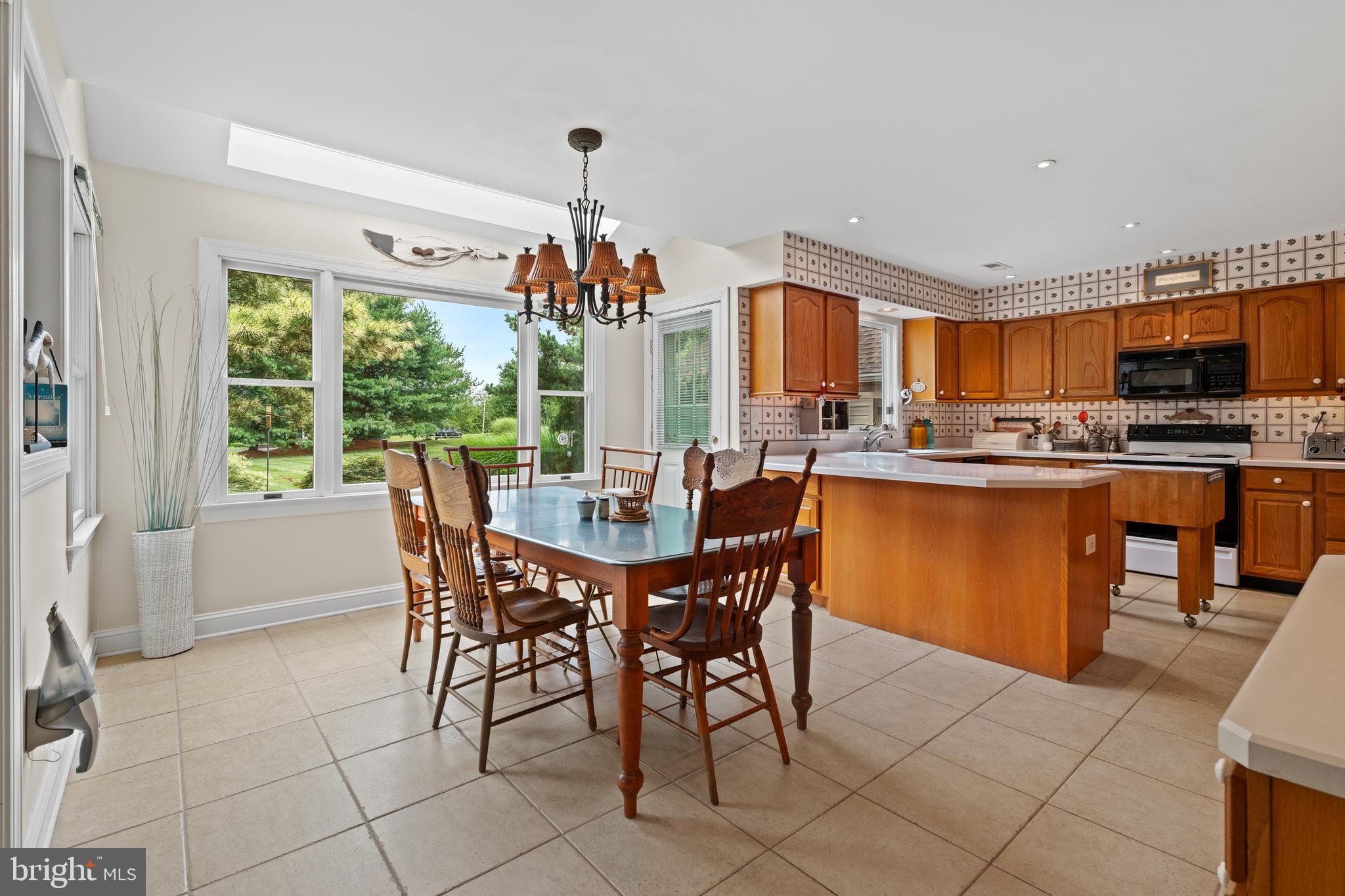 1010 Branch Mill Road Telford, PA 18969 - Photo 23 of 74 a view of a dining room with furniture window and outside view