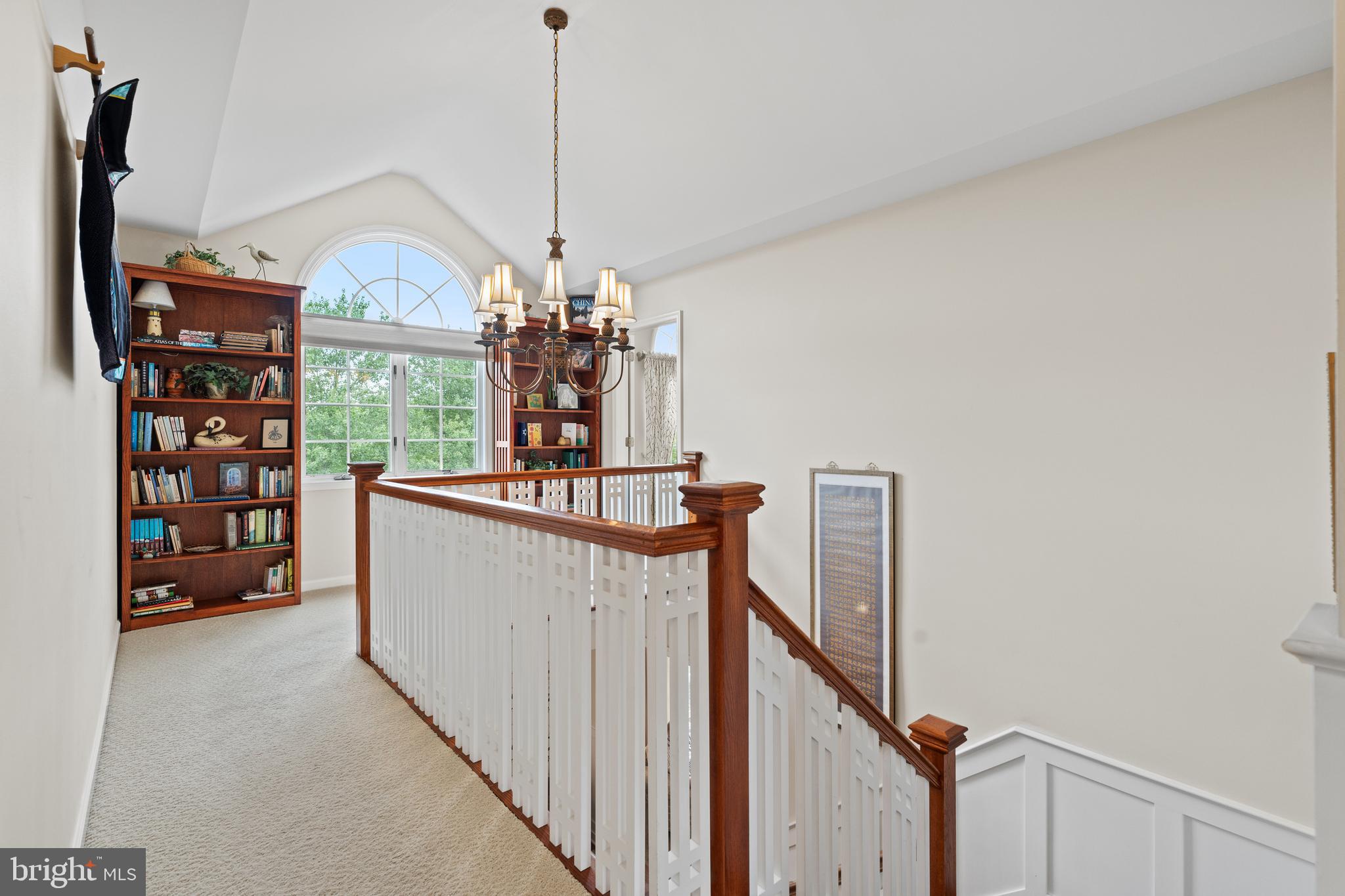 1010 Branch Mill Road Telford, PA 18969 - Photo 25 of 74 a view of a hallway with a cabinet and chandelier