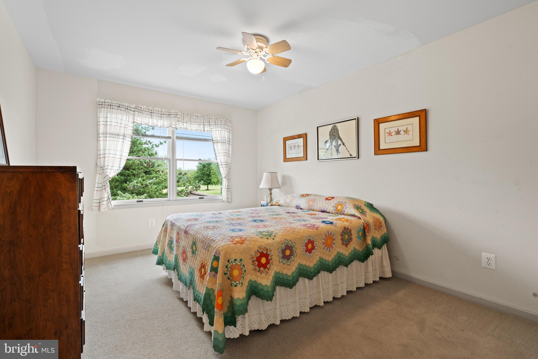 1010 Branch Mill Road Telford, PA 18969 - Photo 37 of 74 a bedroom with a bed and a painting on the wall