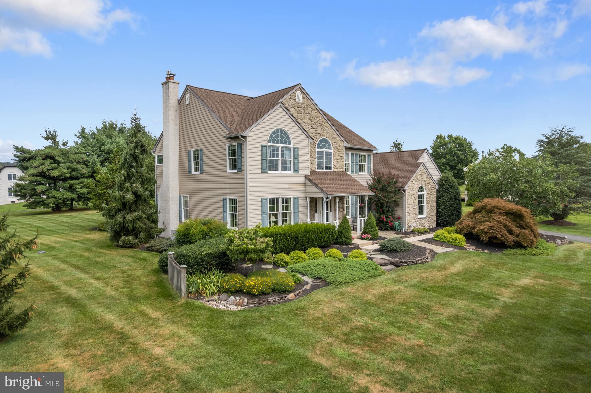 1010 Branch Mill Road Telford, PA 18969 - Photo 5 of 74 a front view of a house with garden