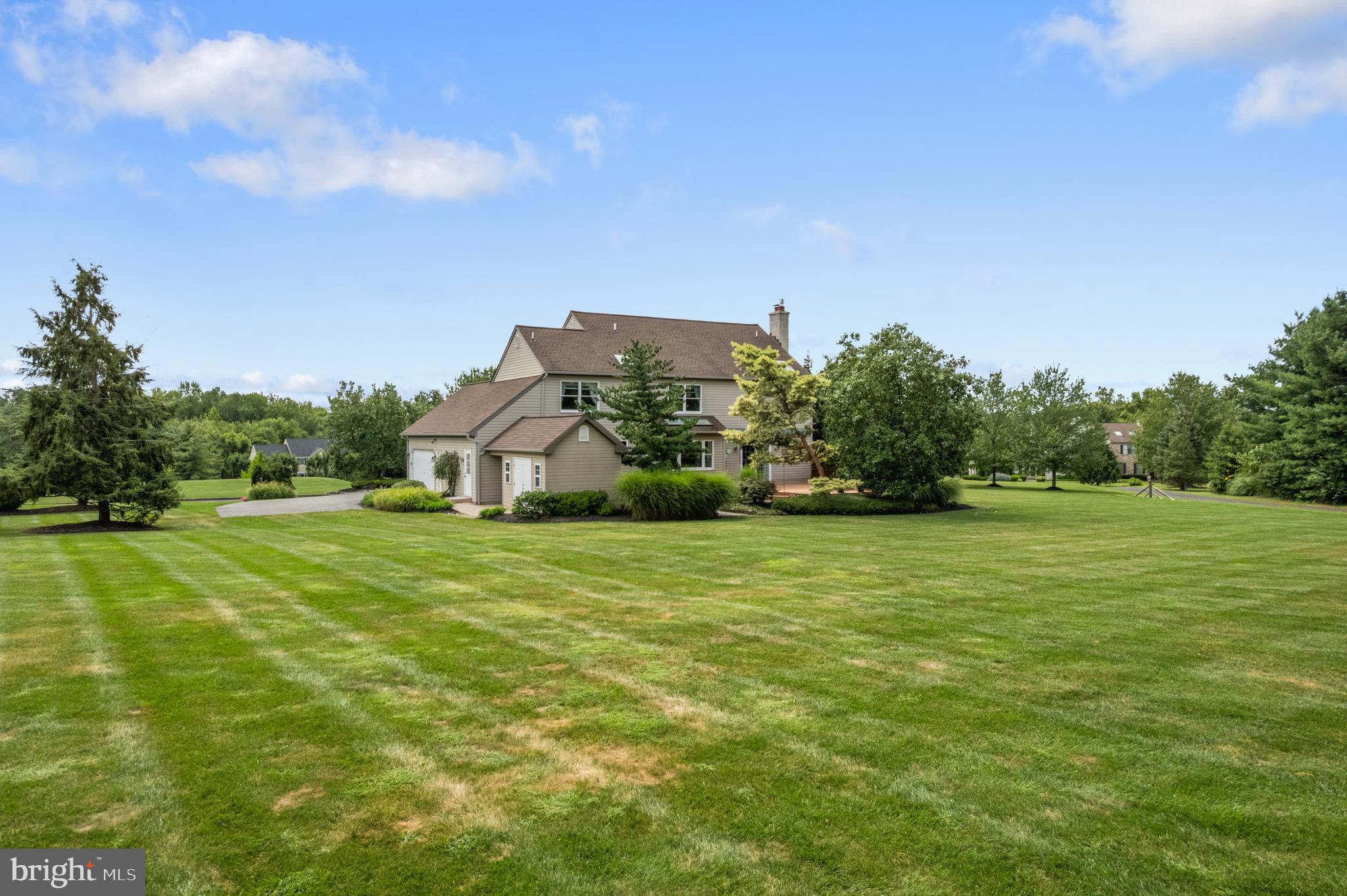 1010 Branch Mill Road Telford, PA 18969 - Photo 56 of 74 a front view of a house with a yard