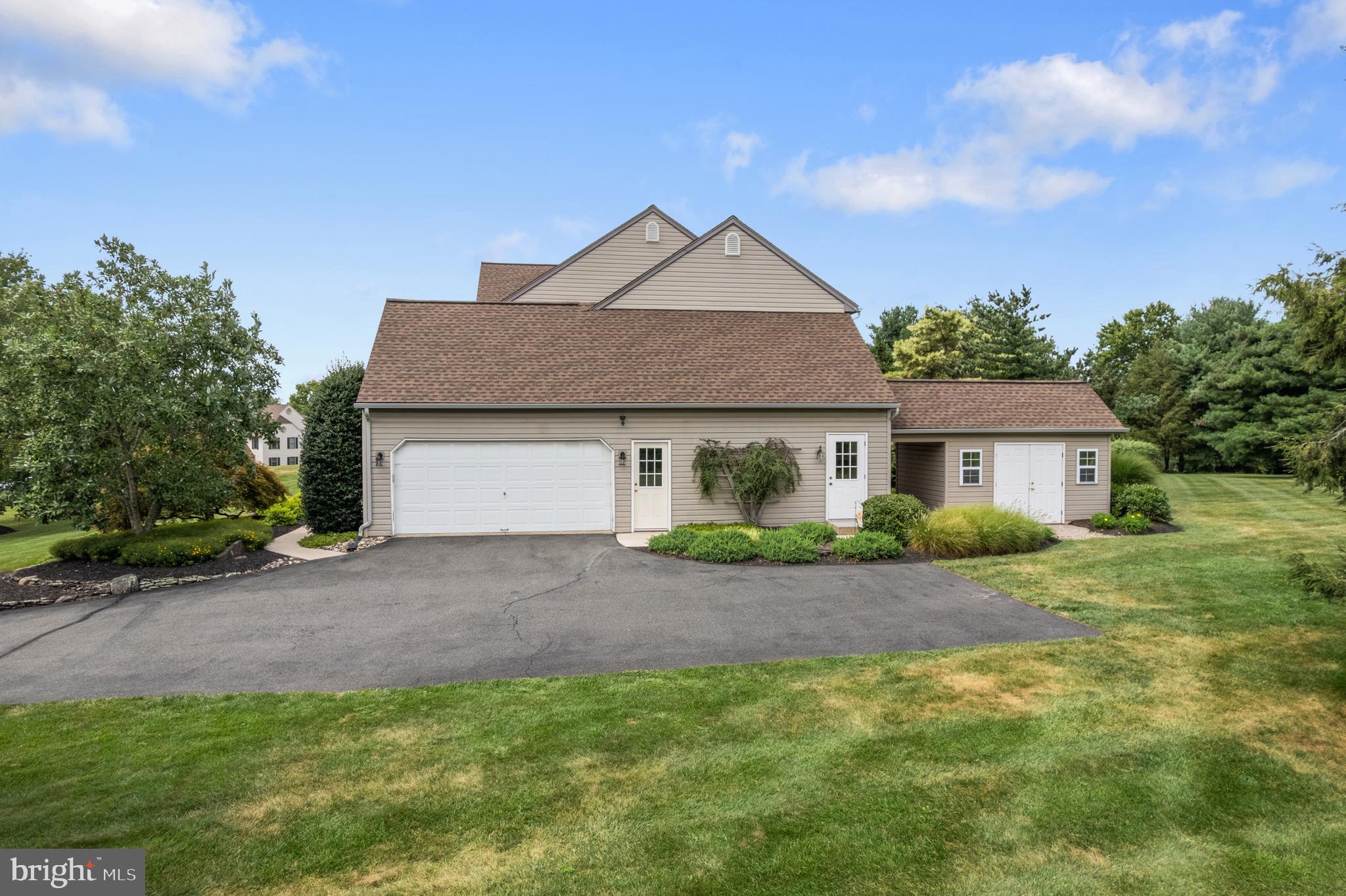 1010 Branch Mill Road Telford, PA 18969 - Photo 59 of 74 a front view of a house with garden