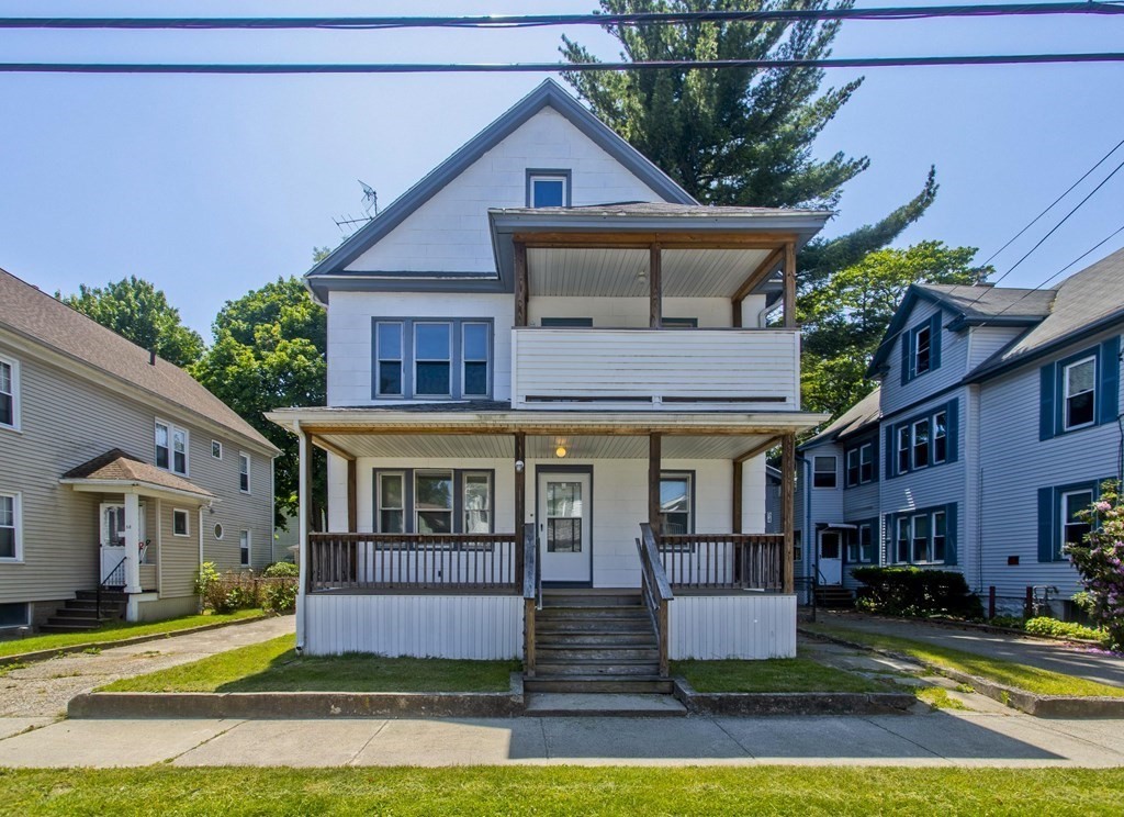 52-54 Draper Street Springfield, MA 01108 - Photo 2 of 31 a front view of house with yard and green space