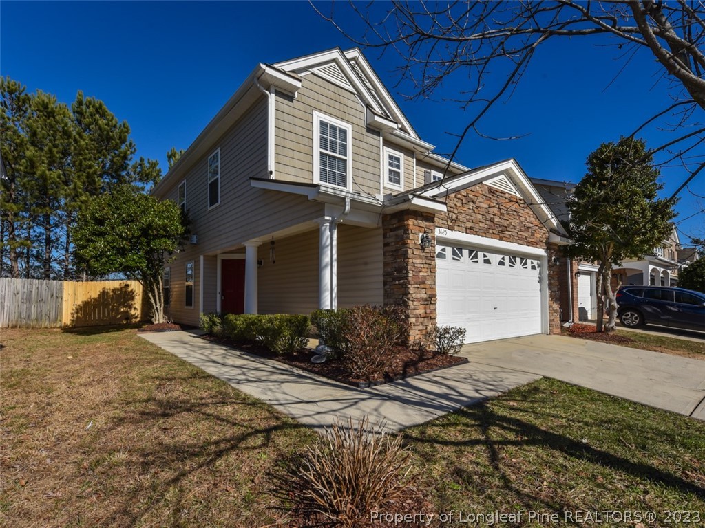 3625 Marshlane Way Raleigh, NC 27610 - Photo 1 of 37 a front view of a house with a yard