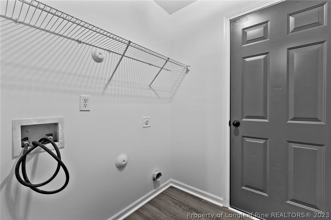 3625 Marshlane Way Raleigh, NC 27610 - Photo 15 of 37 a bathroom with a granite countertop sink and a mirror