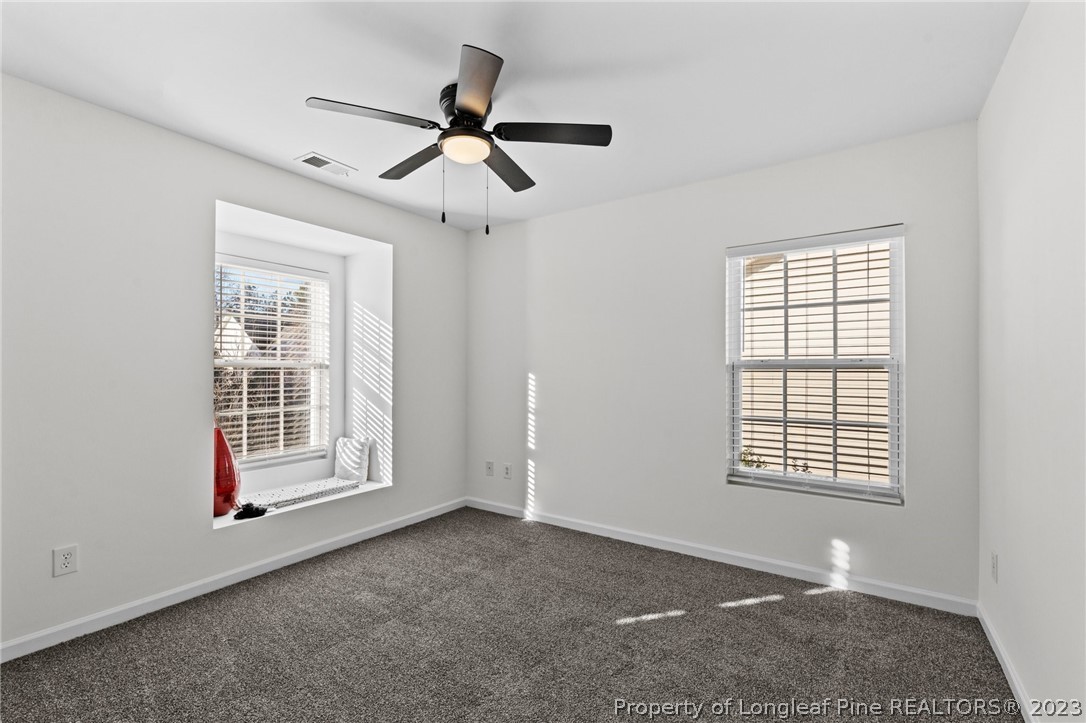3625 Marshlane Way Raleigh, NC 27610 - Photo 20 of 37 a view of an empty room with a window
