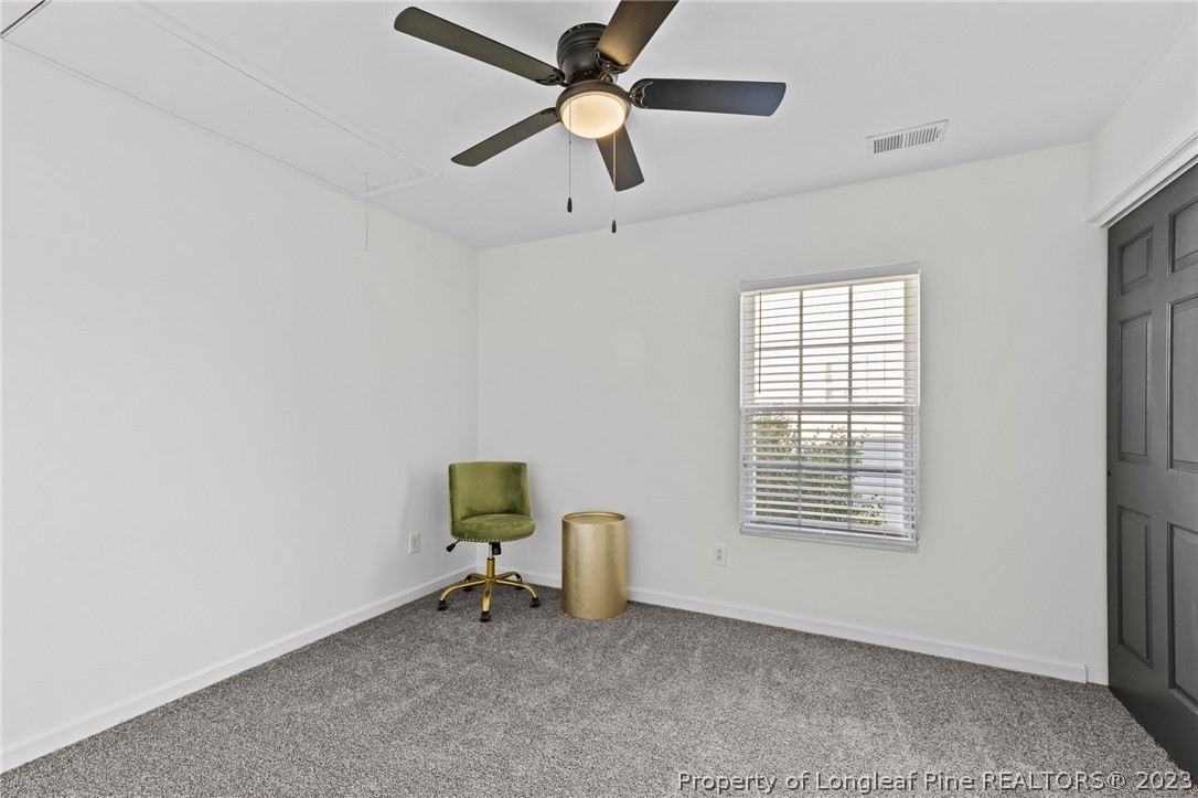 3625 Marshlane Way Raleigh, NC 27610 - Photo 22 of 37 an empty room with windows and fan