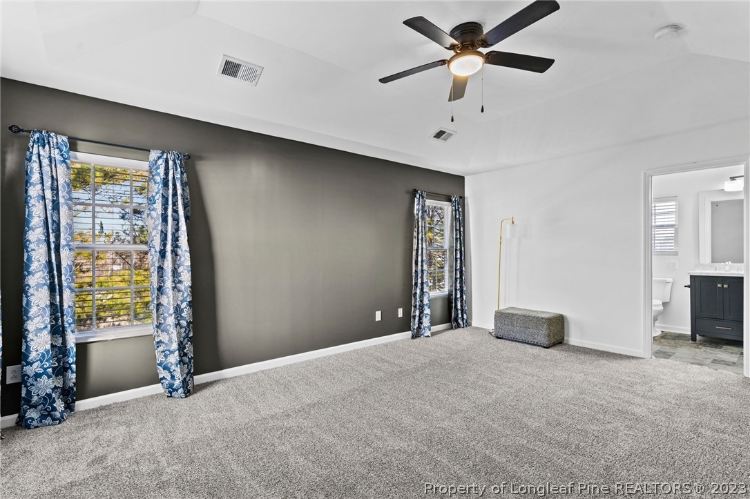 3625 Marshlane Way Raleigh, NC 27610 - Photo 24 of 37 a view of an empty room with a window
