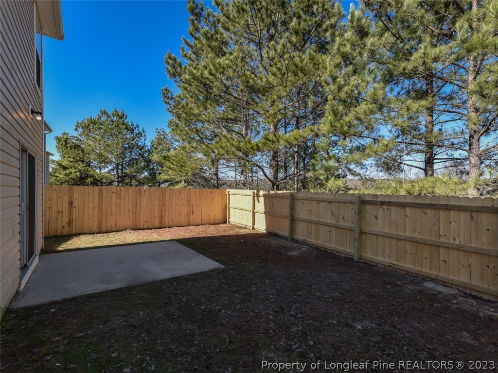 3625 Marshlane Way Raleigh, NC 27610 - Photo 31 of 37 a view of backyard and tree