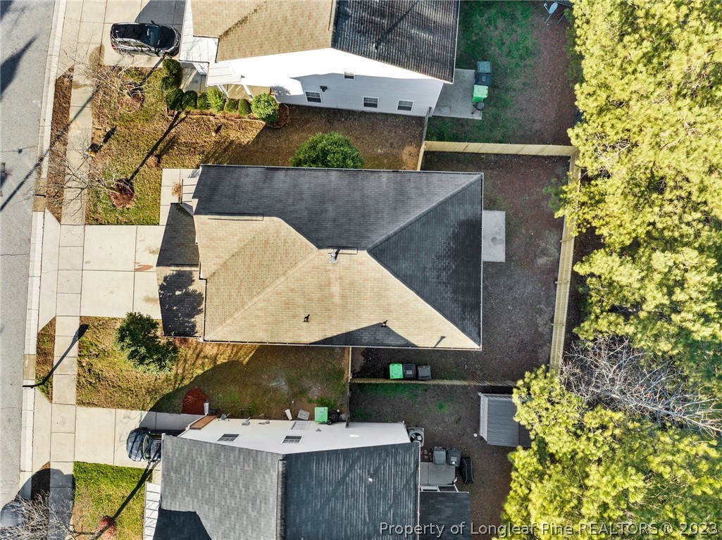 3625 Marshlane Way Raleigh, NC 27610 - Photo 35 of 37 an aerial view of a house with a yard and large tree