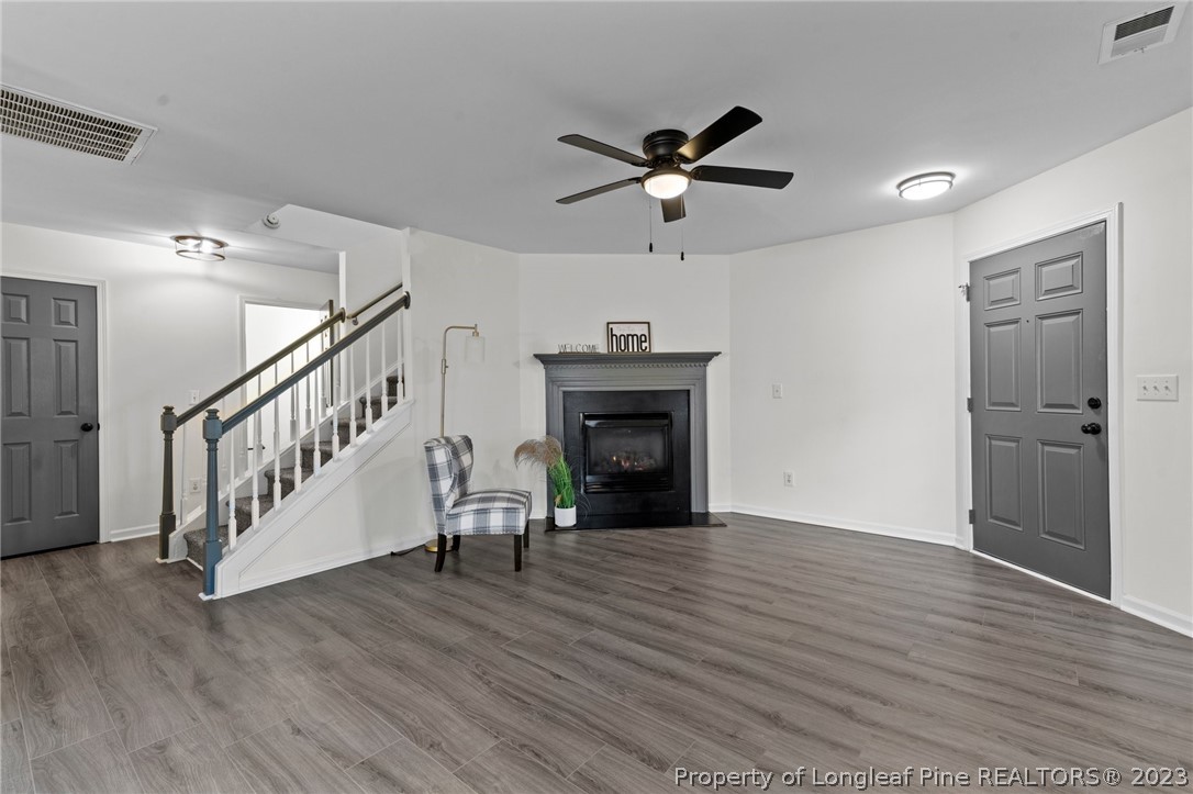 3625 Marshlane Way Raleigh, NC 27610 - Photo 5 of 37 a view of an empty room window and wooden floor