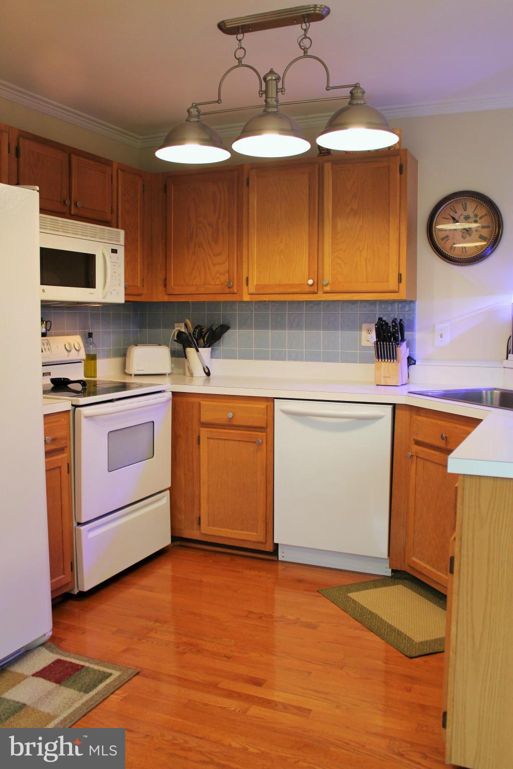 8850 Fox Circle Perry Hall, MD 21128 - Photo 12 of 30 a kitchen with a sink and cabinets