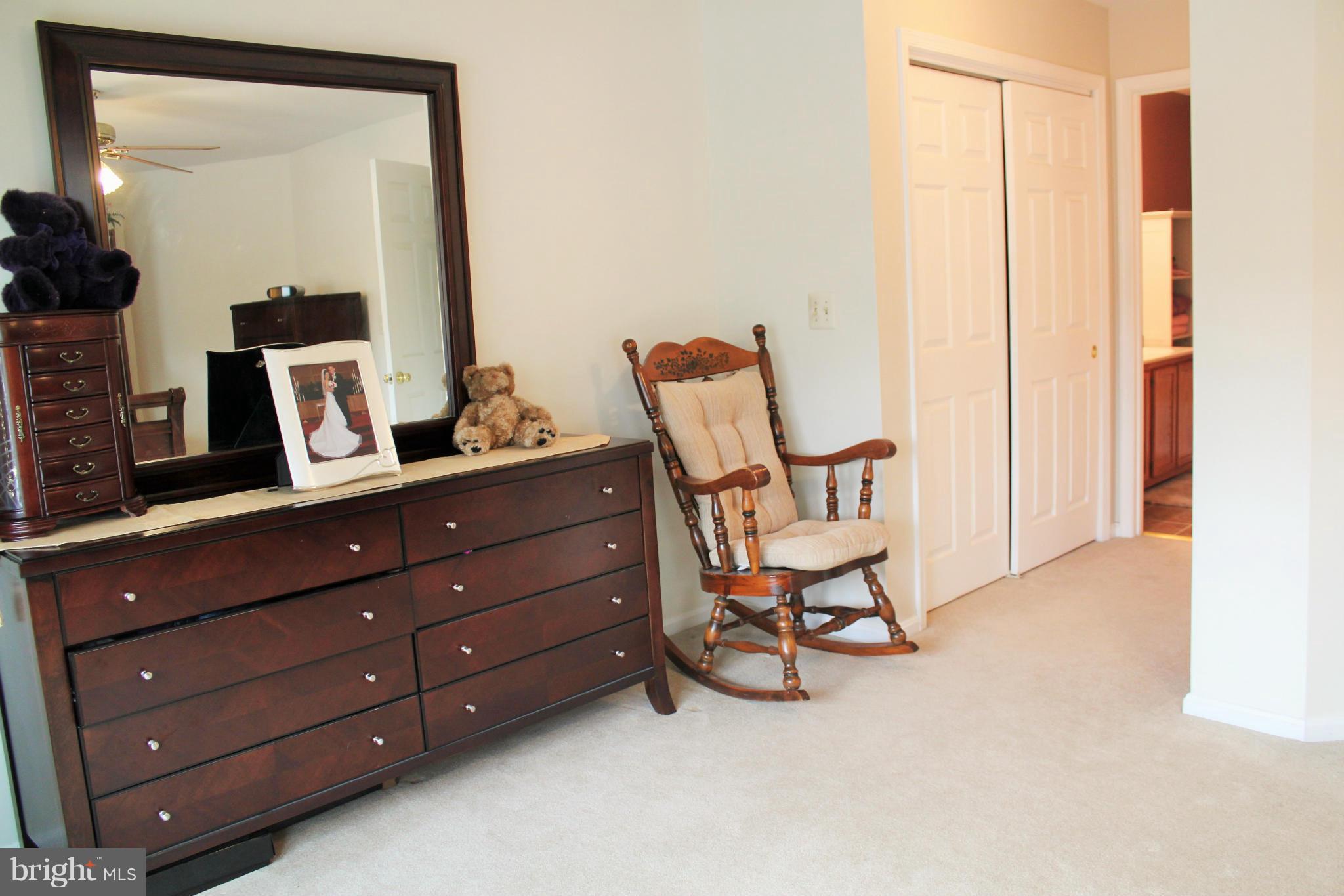 8850 Fox Circle Perry Hall, MD 21128 - Photo 17 of 30 a view of furniture and mirror on dresser