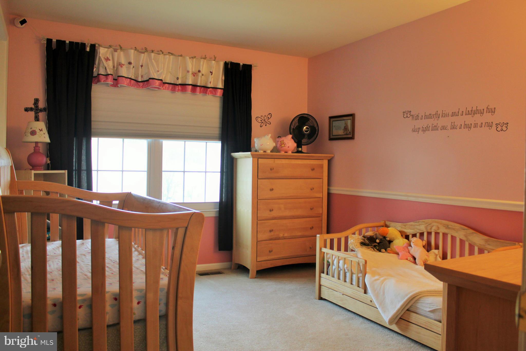 8850 Fox Circle Perry Hall, MD 21128 - Photo 20 of 30 a view of a bedroom with baby crib