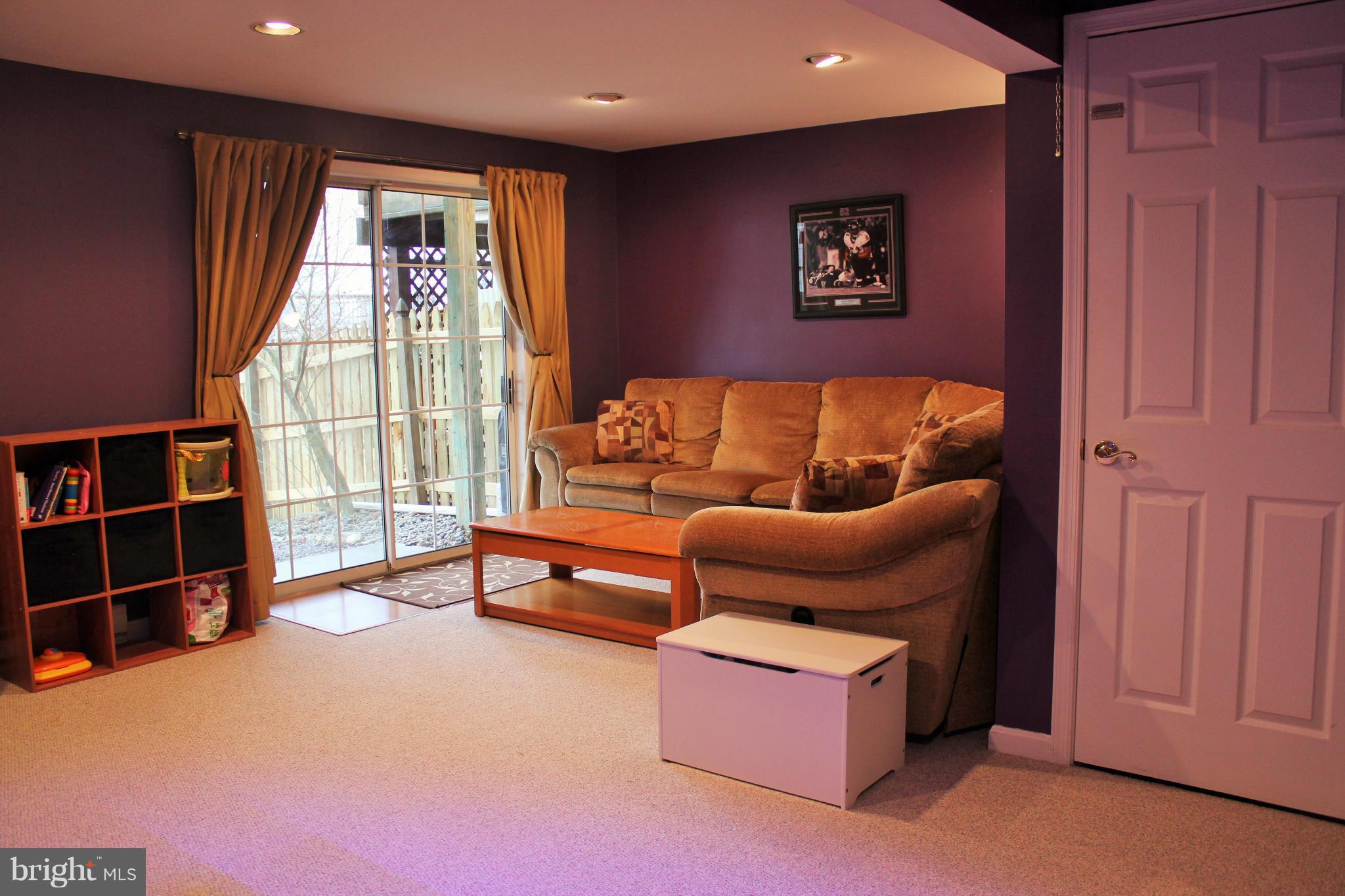 8850 Fox Circle Perry Hall, MD 21128 - Photo 21 of 30 a living room with furniture and a window