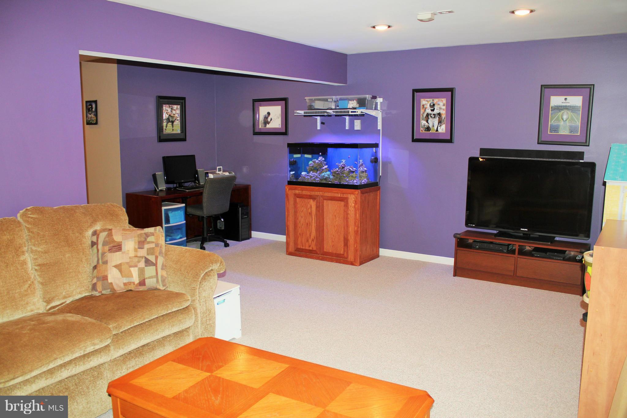 8850 Fox Circle Perry Hall, MD 21128 - Photo 23 of 30 a living room with furniture and a flat screen tv