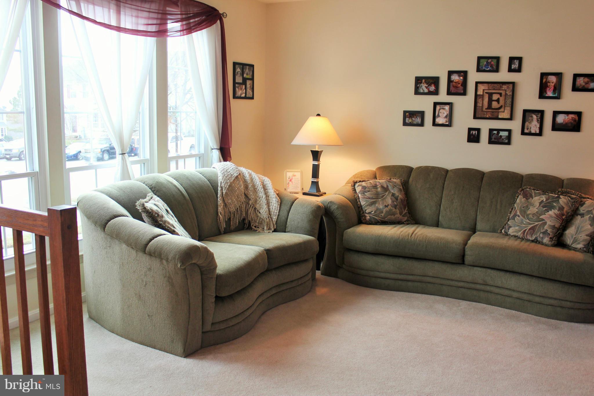 8850 Fox Circle Perry Hall, MD 21128 - Photo 4 of 30 a living room with furniture and a large window