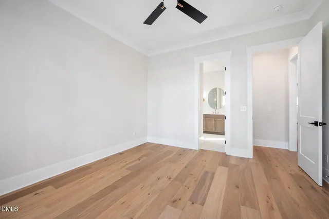 a kitchen with kitchen island a sink stainless steel appliances and cabinets