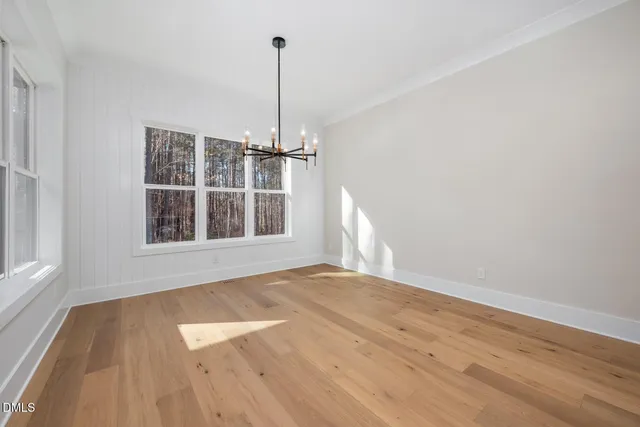 a bathroom with a granite countertop sink mirror shower and bathtub