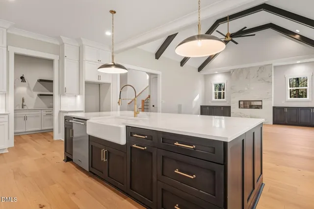 a spacious bathroom with a bathtub and shower