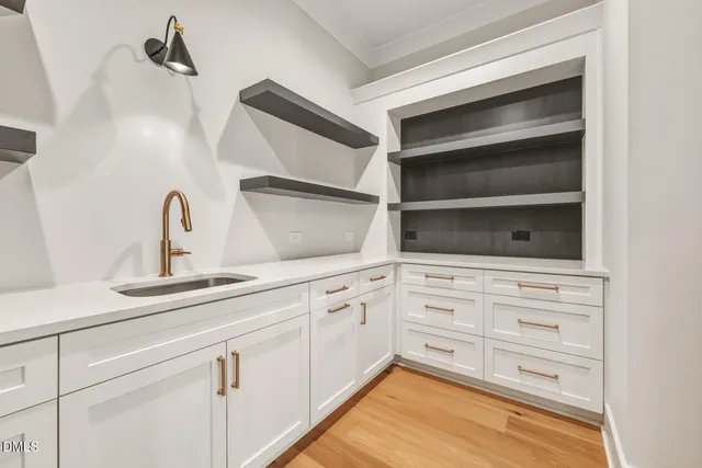 a view of a sink and mirror